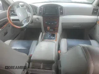 2007 Jeep Grand Cherokee Overland with VIN 1J8HR68227C579883, listed as a Copart auction lot 65282225 with 224,059 mi miles and Clean title. Bid and sale history available at DreamBid. Image 8.