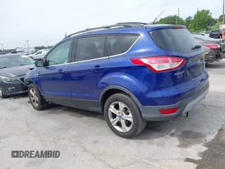 2013 Ford Escape SE with VIN 1FMCU0GXXDUB85818, listed as a IAAI auction lot 41848033 with 128,638 mi miles and . Bid and sale history available at DreamBid. Image 14.