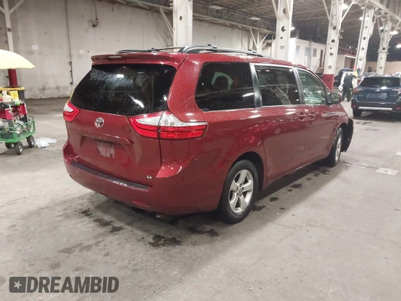 2015 Toyota Sienna LE AAS with VIN 5TDKK3DC2FS609296, listed as a IAAI auction lot 41842166 with 160,342 mi miles. Bid and sale history available at carsss.com. Image 4.