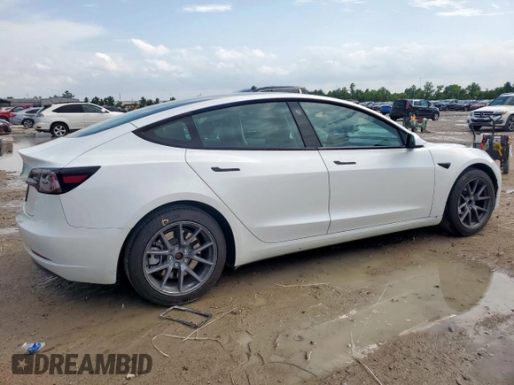 2023 Tesla Model 3 with VIN 5YJ3E1EA1PF550454, listed as a Copart auction lot 58985695 with 19,199 mi miles and Salvage title. Bid and sale history available at DreamBid. Image 3.