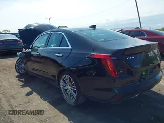 2021 Cadillac CT4 Premium Luxury z VIN 1G6DF5RK8M0121711, wystawiony jako IAAI lot #42197628 z przebiegiem Nie podano mil oraz . Historia ofert i sprzedaży dostępna na DreamBid. Obrazek 3.