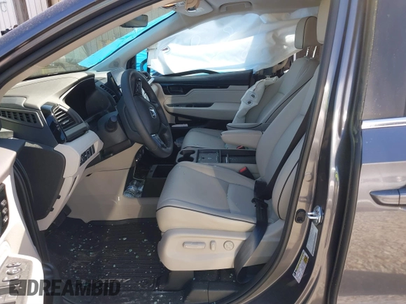 2025 Honda Odyssey Touring z VIN 5FNRL6H84SB028769, wystawiony jako IAAI lot #41856080 z przebiegiem Nie podano mil oraz . Historia ofert i sprzedaży dostępna na DreamBid. Obrazek 5.