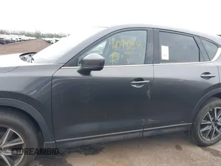 2017 Mazda CX-5 Grand Touring with VIN JM3KFBDL3H0143194, listed as a IAAI auction lot 42049258 with 74,159 mi miles. Bid and sale history available at carsss.com. Image 14.