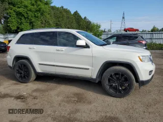 2011 Jeep Grand Cherokee Laredo z VIN 1J4RR4GG1BC506083, wystawiony jako Copart lot #58498295 z przebiegiem 122 847 mil mil oraz Czysty tytuł • Clean title. Historia ofert i sprzedaży dostępna na DreamBid. Obrazek 4.