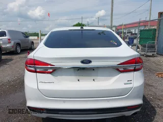 2017 Ford Fusion SE z VIN 3FA6P0HD7HR309432, wystawiony jako IAAI lot #42163947 z przebiegiem 201 575 mil mil oraz . Historia ofert i sprzedaży dostępna na DreamBid. Obrazek 16.