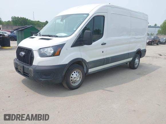 2024 Ford Transit Cargo with VIN 1FTBR2C82RKA72122, listed as a IAAI auction lot 42432209 with 26,806 mi miles and . Bid and sale history available at DreamBid. Image 2.
