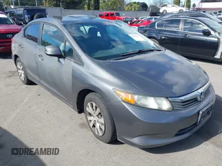 2012 Honda Civic LX z VIN 2HGFB2F54CH561984, wystawiony jako IAAI lot #41500409 z przebiegiem 163 872 mil mil oraz . Historia ofert i sprzedaży dostępna na DreamBid. Obrazek 1.
