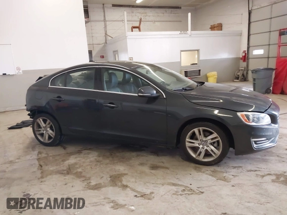 2015 Volvo S60 T5 Drive-E Premier Plus with VIN YV126MFC6F1313759, listed as a IAAI auction lot 41748305 with 43,491 mi miles and . Bid and sale history available at DreamBid. Image 14.