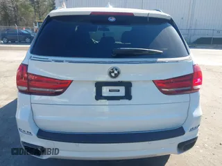 2015 BMW X5 xDrive35i z VIN 5UXKR0C52F0P15584, wystawiony jako IAAI lot #41965143 z przebiegiem 94 118 mil mil oraz . Historia ofert i sprzedaży dostępna na DreamBid. Obrazek 16.