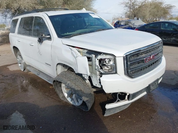 2017 GMC Yukon SLT with VIN 1GKS2BKC7HR376552, listed as a IAAI auction lot 41450226 with 124,590 mi miles. Bid and sale history available at carsss.com. Image 1.