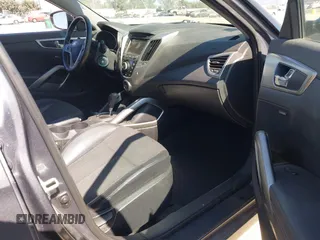 2013 Hyundai Veloster w/Black Int with VIN KMHTC6AD5DU095867, listed as a IAAI auction lot 42698380 with 115,528 mi miles and . Bid and sale history available at DreamBid. Image 5.
