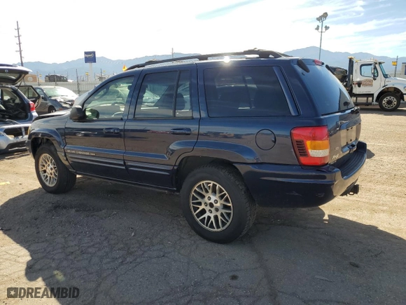 2004 Jeep Grand Cherokee Limited with VIN 1J4GW58S54C166433, listed as a Copart auction lot 71649454 with 174,603 mi miles and Salvage Title. Bid and sale history available at carsss.com. Image 2.