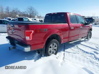 2016 Ford F-150 XLT with VIN 1FTFW1EG1GKD16719, listed as a IAAI auction lot 41494417 with 124,063 mi miles. Bid and sale history available at carsss.com. Image 4.
