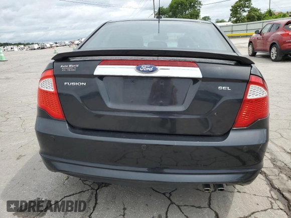 2012 Ford Fusion SEL with VIN 3FAHP0JA0CR386841, listed as a Copart auction lot 61587325 with 129,572 mi miles and Salvage title. Bid and sale history available at DreamBid. Image 6.