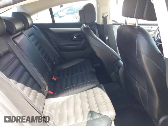 2014 Volkswagen CC R-Line with VIN WVWBP7AN0EE527649, listed as a IAAI auction lot 42009588 with 122,964 mi miles. Bid and sale history available at carsss.com. Image 8.