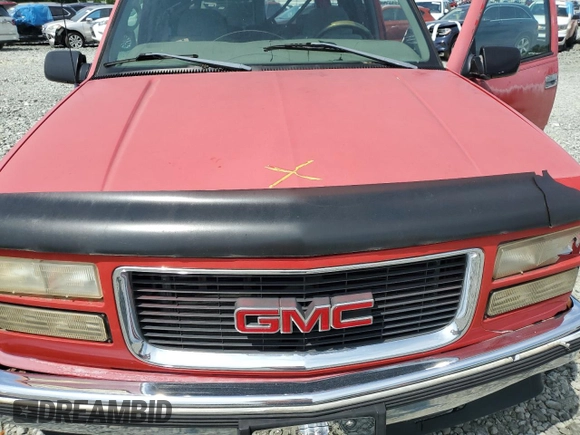 1999 GMC Yukon with VIN 1GKEK13R5XJ700234, listed as a Copart auction lot 55885584 with 163,129 mi miles and Salvage Title. Bid and sale history available at carsss.com. Image 12.