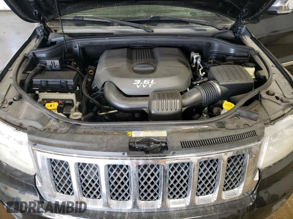 2013 Jeep Grand Cherokee Overland with VIN 1C4RJFCG7DC646348, listed as a Copart auction lot 49526415 with 137,889 mi miles and Clean Title. Bid and sale history available at carsss.com. Image 12.