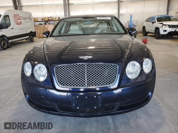 2006 Bentley Flying Spur z VIN SCBBR53W06C037412, wystawiony jako Copart lot #50492605 z przebiegiem 59 005 mil mil oraz Szkody całkowita. Historia ofert i sprzedaży dostępna na DreamBid. Obrazek 5.