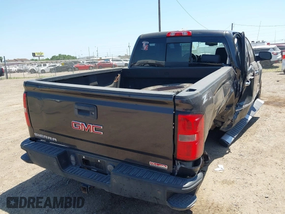 2015 GMC Sierra 1500 SLT with VIN 3GTU2VEC5FG457905, listed as a IAAI auction lot 42026975 with 160,637 mi miles and . Bid and sale history available at DreamBid. Image 4.