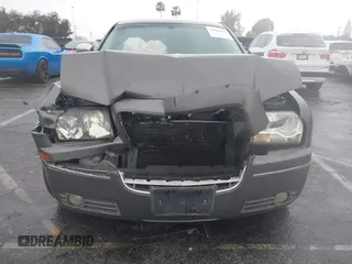 2010 Chrysler 300 Touring with VIN 2C3CA5CV2AH125842, listed as a IAAI auction lot 41804591 with 241,216 mi miles. Bid and sale history available at carsss.com. Image 6.