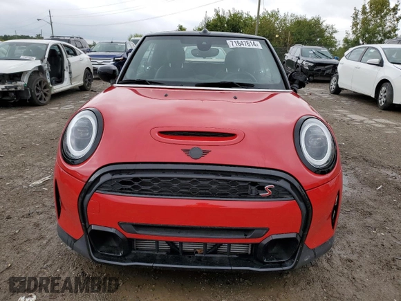 2023 MINI Convertible Cooper S с VIN WMW43DL07P3P47046, выставлен на аукционе Copart как лот 71647614 с пробегом 10 498 миль миль и Списание • Salvage title. История ставок и продаж доступна на DreamBid. Изображение 5.