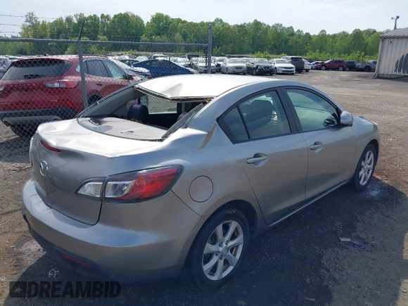 2011 Mazda Mazda3 i Touring with VIN JM1BL1VGXB1372499, listed as a IAAI auction lot 42112283 with 98,564 mi miles. Bid and sale history available at carsss.com. Image 4.