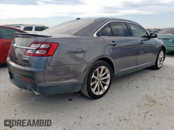 2013 Ford Taurus Limited z VIN 1FAHP2F89DG187913, wystawiony jako Copart lot #57096865 z przebiegiem 93 575 mil mil oraz Szkoda całkowita • Salvage title. Historia ofert i sprzedaży dostępna na DreamBid. Obrazek 3.