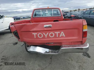 1990 Toyota Pickup DX с VIN JT4RN81P1L5069080, выставлен на аукционе Copart как лот 81606084 с пробегом 168 115 миль миль и Списание • Salvage title. История ставок и продаж доступна на DreamBid. Изображение 6.