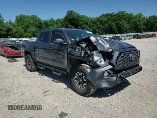 2023 Toyota Tacoma SR with VIN 3TYCZ5AN9PT131515, listed as a Copart auction lot 57900865 with Not provided miles and Salvage title. Bid and sale history available at DreamBid. Image 14.
