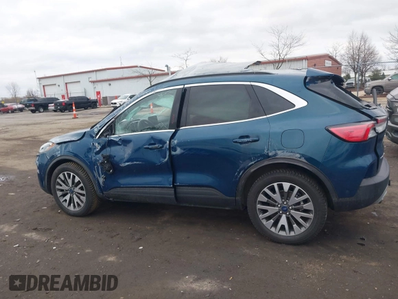 2020 Ford Escape Titanium with VIN 1FMCU9J98LUC00068, listed as a IAAI auction lot 41843755 with 42,525 mi miles and . Bid and sale history available at DreamBid. Image 14.