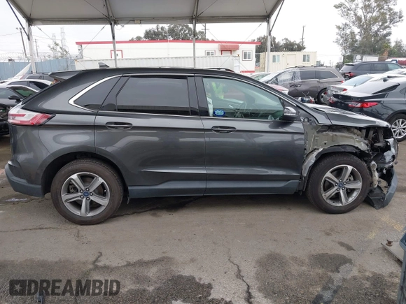 2020 Ford Edge SEL z VIN 2FMPK3J95LBA27779, wystawiony jako IAAI lot #42139536 z przebiegiem 58 285 mil mil oraz . Historia ofert i sprzedaży dostępna na DreamBid. Obrazek 14.
