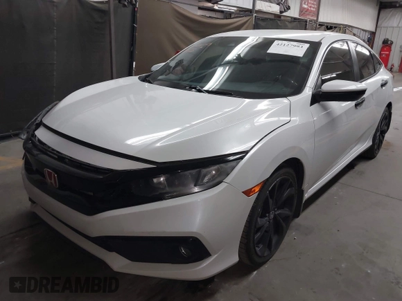 2019 Honda Civic Sport with VIN 19XFC2F86KE022749, listed as a IAAI auction lot 42127993 with 116,279 mi miles and . Bid and sale history available at DreamBid. Image 2.