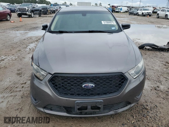 2014 Ford Taurus SE z VIN 1FAHP2D86EG143517, wystawiony jako Copart lot #51066975 z przebiegiem 134 892 mil mil oraz Szkoda całkowita • Salvage title. Historia ofert i sprzedaży dostępna na DreamBid. Obrazek 5.