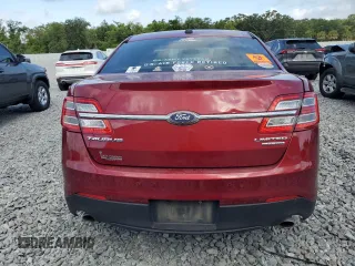2018 Ford Taurus Limited z VIN 1FAHP2F8XJG111113, wystawiony jako Copart lot #54953145 z przebiegiem 138 736 mil mil oraz Nie do naprawy • Non repairable. Historia ofert i sprzedaży dostępna na DreamBid. Obrazek 6.