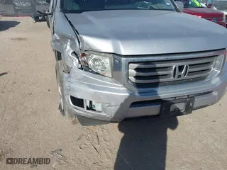 2014 Honda Ridgeline RTL with VIN 5FPYK1F5XEB008421, listed as a IAAI auction lot 41266050 with 86,490 mi miles. Bid and sale history available at carsss.com. Image 6.