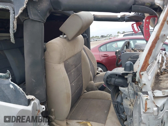 2009 Jeep Wrangler X with VIN 1J4FA24149L775557, listed as a IAAI auction lot 42363653 with Not provided miles and . Bid and sale history available at DreamBid. Image 5.