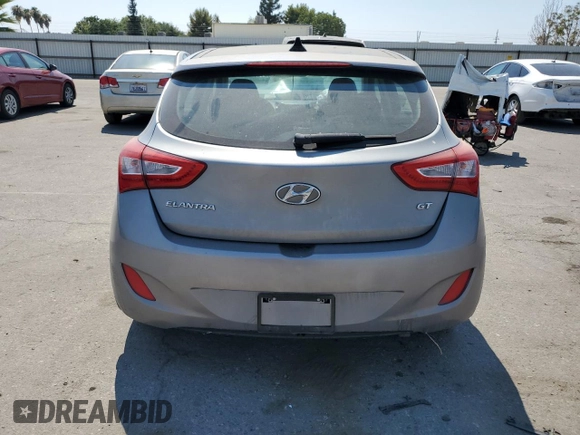 2014 Hyundai Elantra GT with VIN KMHD35LH5EU200326, listed as a Copart auction lot 61170234 with 0 mi miles and Salvage Title. Bid and sale history available at carsss.com. Image 6.