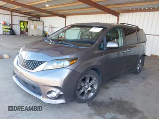 2015 Toyota Sienna SE with VIN 5TDXK3DC1FS667924, listed as a IAAI auction lot 42062805 with 123,504 mi miles. Bid and sale history available at carsss.com. Image 17.