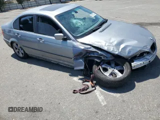 2005 BMW 3 Series 330i with VIN WBAEV53485KM39295, listed as a Copart auction lot 61581235 with 185,054 mi miles and Salvage title. Bid and sale history available at DreamBid. Image 4.