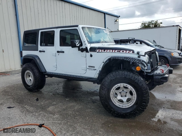 2018 Jeep Wrangler JK Unlimited Rubicon Recon with VIN 1C4BJWFG8JL816211, listed as a Copart auction lot 71461564 with 41,576 mi miles and Salvage Title. Bid and sale history available at carsss.com. Image 4.