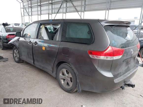 2014 Toyota Sienna L with VIN 5TDZK3DC5ES475204, listed as a IAAI auction lot 41277584 with 125,735 mi miles. Bid and sale history available at carsss.com. Image 3.