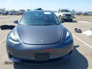 2022 Tesla Model 3 with VIN 5YJ3E1EA6NF144098, listed as a IAAI auction lot 41965360 with 75,597 mi miles. Bid and sale history available at carsss.com. Image 12.