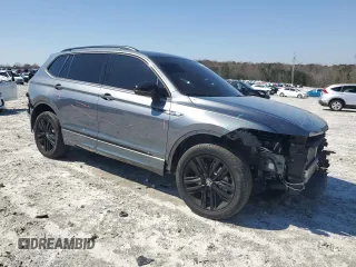 2022 Volkswagen Tiguan SE R-Line Black with VIN 3VVCB7AX5NM080672, listed as a Copart auction lot 48558245 with 29,934 mi miles and Salvage Title. Bid and sale history available at DreamBid. Image 4.