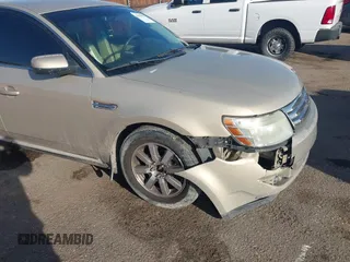 2008 Ford Taurus SEL with VIN 1FAHP24W38G111319, listed as a IAAI auction lot 41585092 with 216,419 mi miles. Bid and sale history available at carsss.com. Image 6.