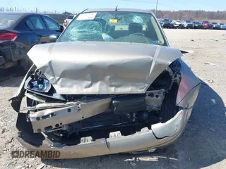 2003 Ford Focus SE with VIN 1FAFP34P03W240199, listed as a IAAI auction lot 41757940 with 91,852 mi miles and . Bid and sale history available at carsss.com. Image 12.