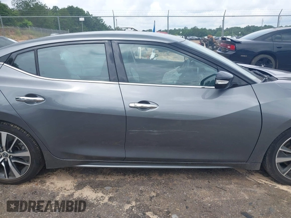 2023 Nissan Maxima SV with VIN 1N4AA6CV0PC510472, listed as a IAAI auction lot 42337170 with 53,633 mi miles and . Bid and sale history available at DreamBid. Image 13.