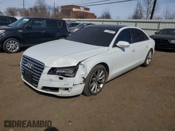 2014 Audi A8 3.0T z VIN WAURGAFD5EN007438, wystawiony jako Copart lot #47979945 z przebiegiem 147 236 mil mil oraz Szkody całkowita. Historia ofert i sprzedaży dostępna na DreamBid. Obrazek 1.