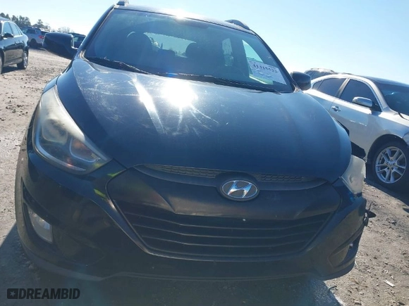 2014 Hyundai Tucson Limited with VIN KM8JU3AG0EU802629, listed as a IAAI auction lot 41315522 with 215,128 mi miles. Bid and sale history available at carsss.com. Image 12.