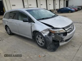 2012 Honda Odyssey EX-L with VIN 5FNRL5H60CB117376, listed as a Copart auction lot 50740725 with 163,716 mi miles and Salvage Title. Bid and sale history available at DreamBid. Image 4.