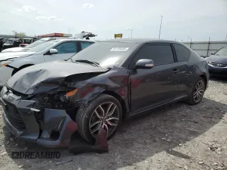 2016 Scion tC z VIN JTKJF5C76GJ014054, wystawiony jako Copart lot #54135695 z przebiegiem 192 785 mil mil oraz Szkoda całkowita • Salvage title. Historia ofert i sprzedaży dostępna na DreamBid. Obrazek 1.